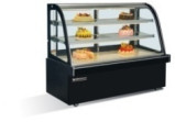 Une vitrine de gâteau de qualité Fours à pâtisserie commerciaux Affichage de gâteau isolé avec base en marbre / acier inoxydable
