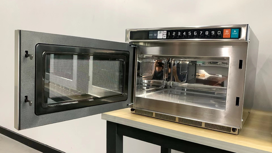 Cuisinier à micro-ondes noir/blanc de 25L pour la cuisson à température de 0 à 200 °C avec contrôle tactile par membrane