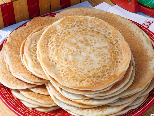 L'équipement de la ligne de production de crêpes à gaz en forme ronde en forme rectangulaire avec capacité réglable et pâte
